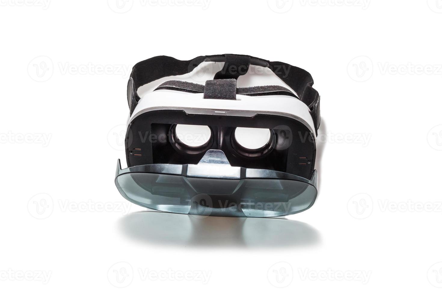 Device for watching movies for travel and entertainment in 3d space. VR AR 360 virtual reality glasses cardboard for mobile phone isolated on white background. photo