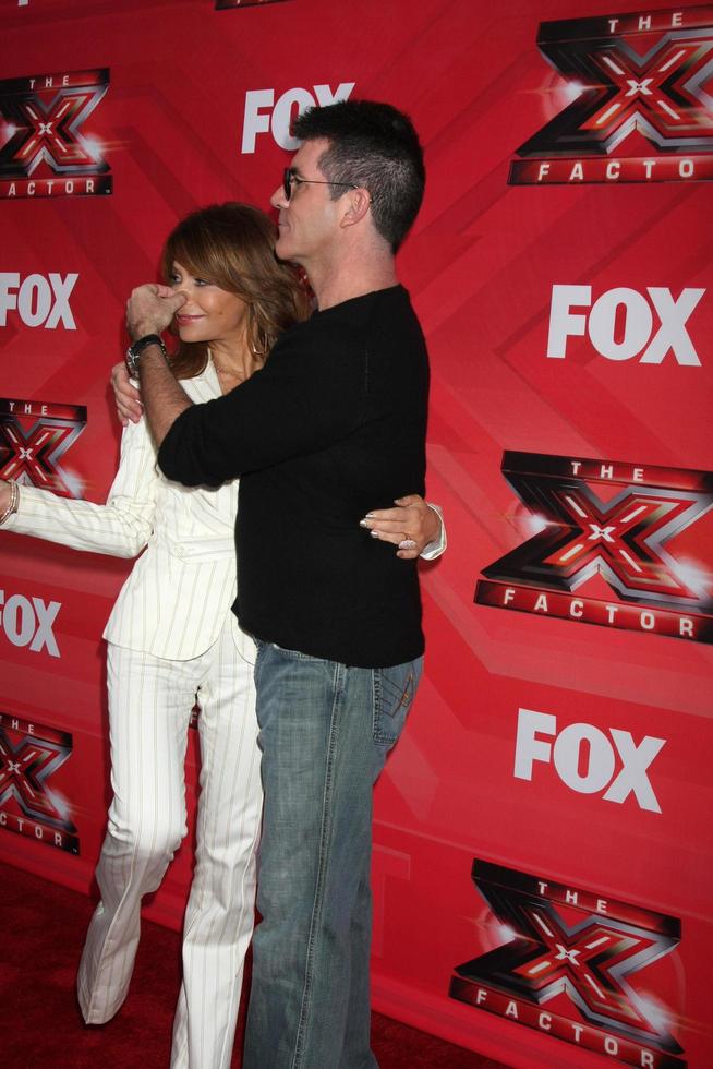 LOS ANGELES, DEC 19 - Paula Abdul, Simon Cowell at the FOX s The X Factor Press Conference at CBS Studios on December 19, 2011 in Los Angeles, CA photo