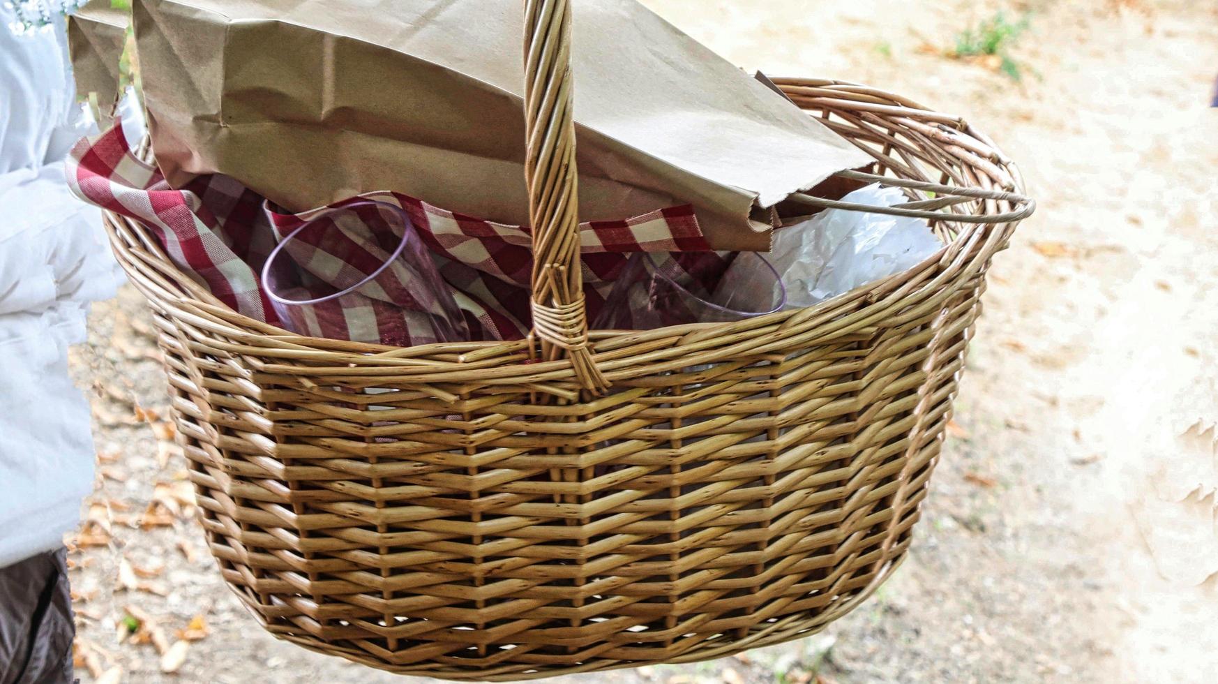 a wicker basket full of provisions and food at the mangialonga of Monta d'Alba, in the Piedmontese Langhe photo