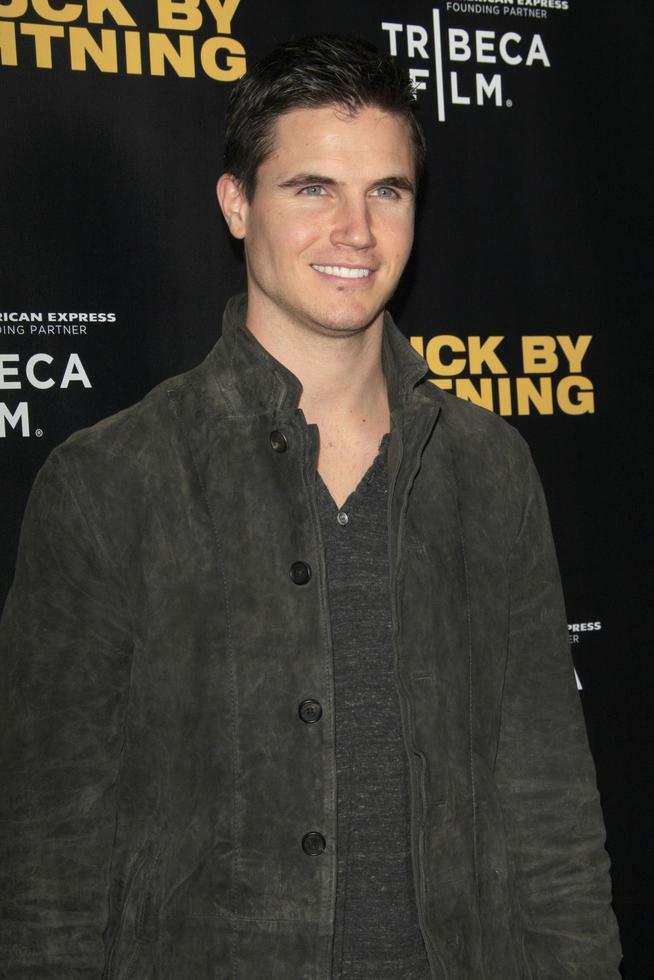 LOS ANGELES, JAN 6 - Robbie Amell at the Struck by Lightening Premiere at the Chinese Cinema 6 Theaters on January 6, 2013 in Los Angeles, CA photo