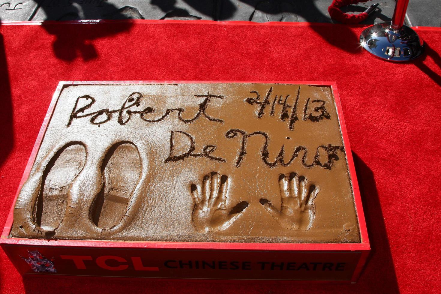 LOS ANGELES, FEB 4 - Robert DeNiro hand and foot prints in cement at the Robert DeNiro Handprint and Footprint Ceremony at the TCL Chinese Theater forcourt on February 4, 2013 in Los Angeles, CA photo