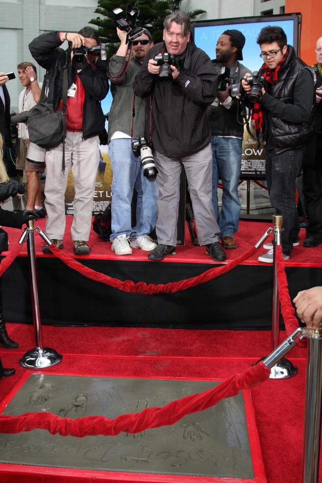LOS ANGELES, JAN 5 - Press shooting Robert Duvall s Handprints and Footprints at the Robert Duvall Hand and Footprint Ceremony at Grauman s Chinese Theater on January 5, 2011 in Los Angeles, CA photo