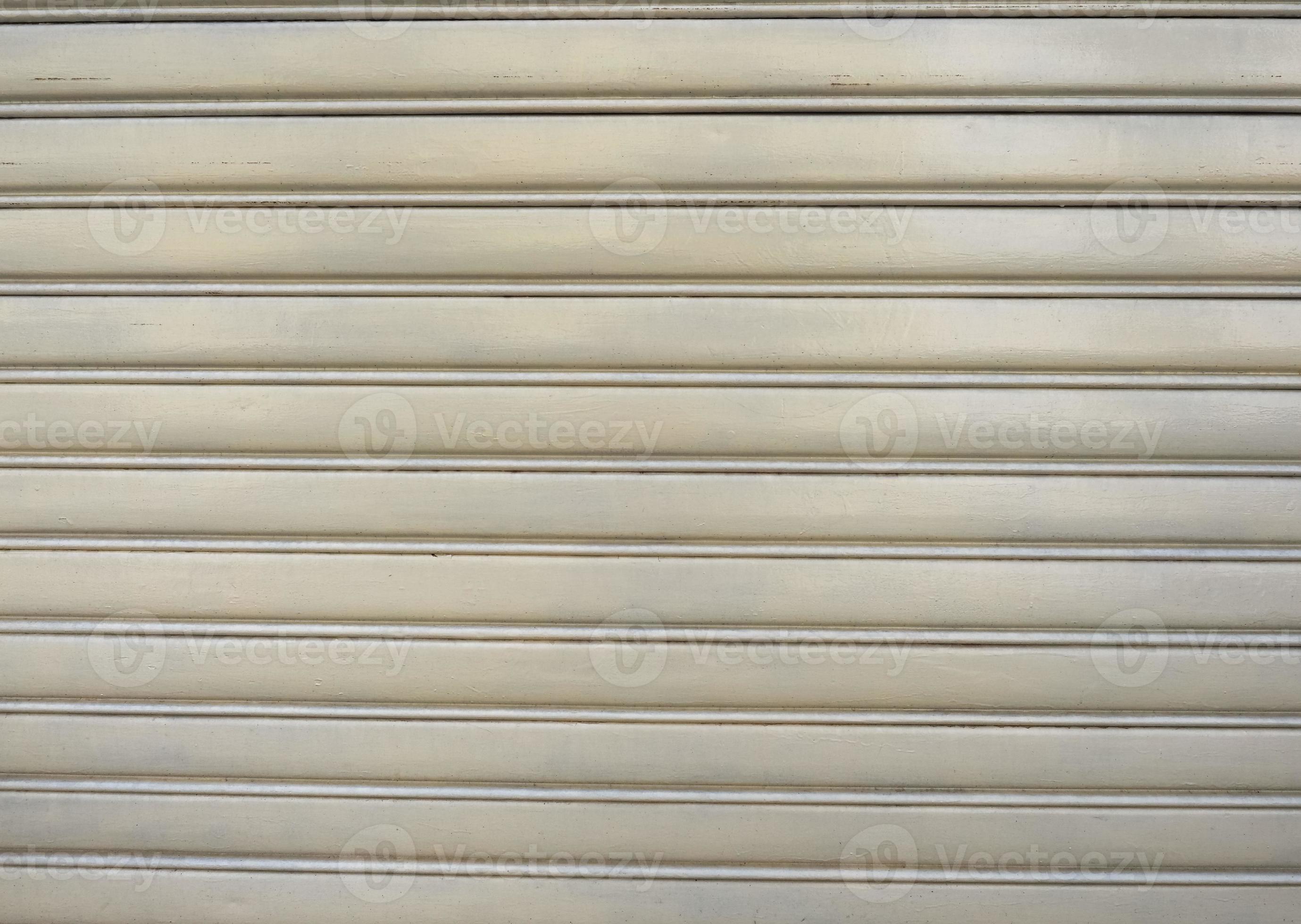 yellow aluminium rolling shutter metal texture background 9845949 Stock
