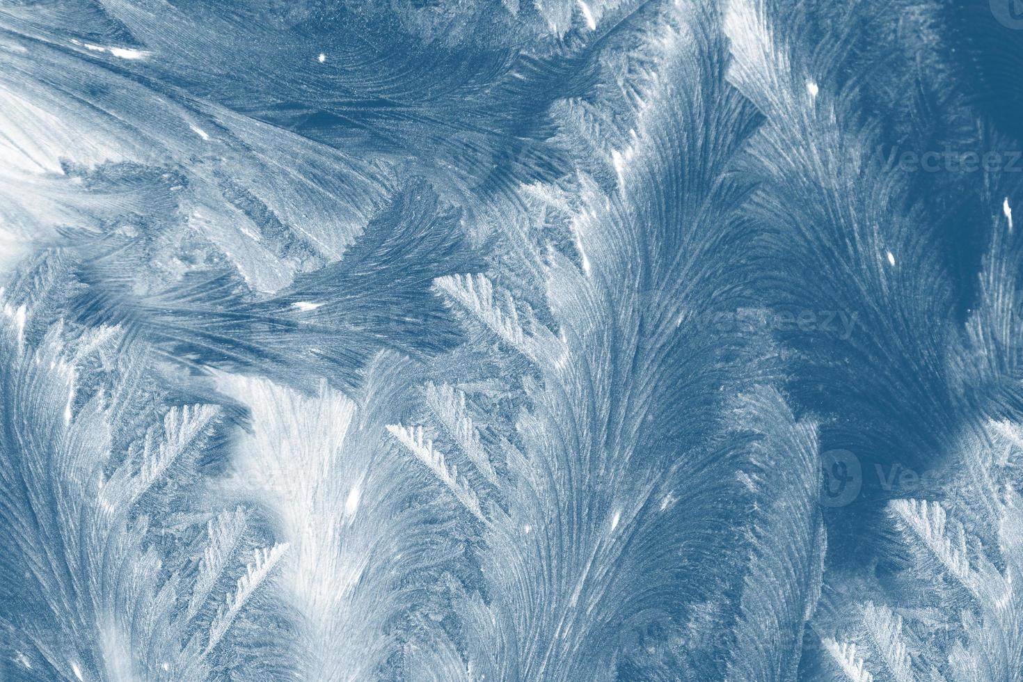 Abstract ice frost natural background with hoarfrost crystals. photo