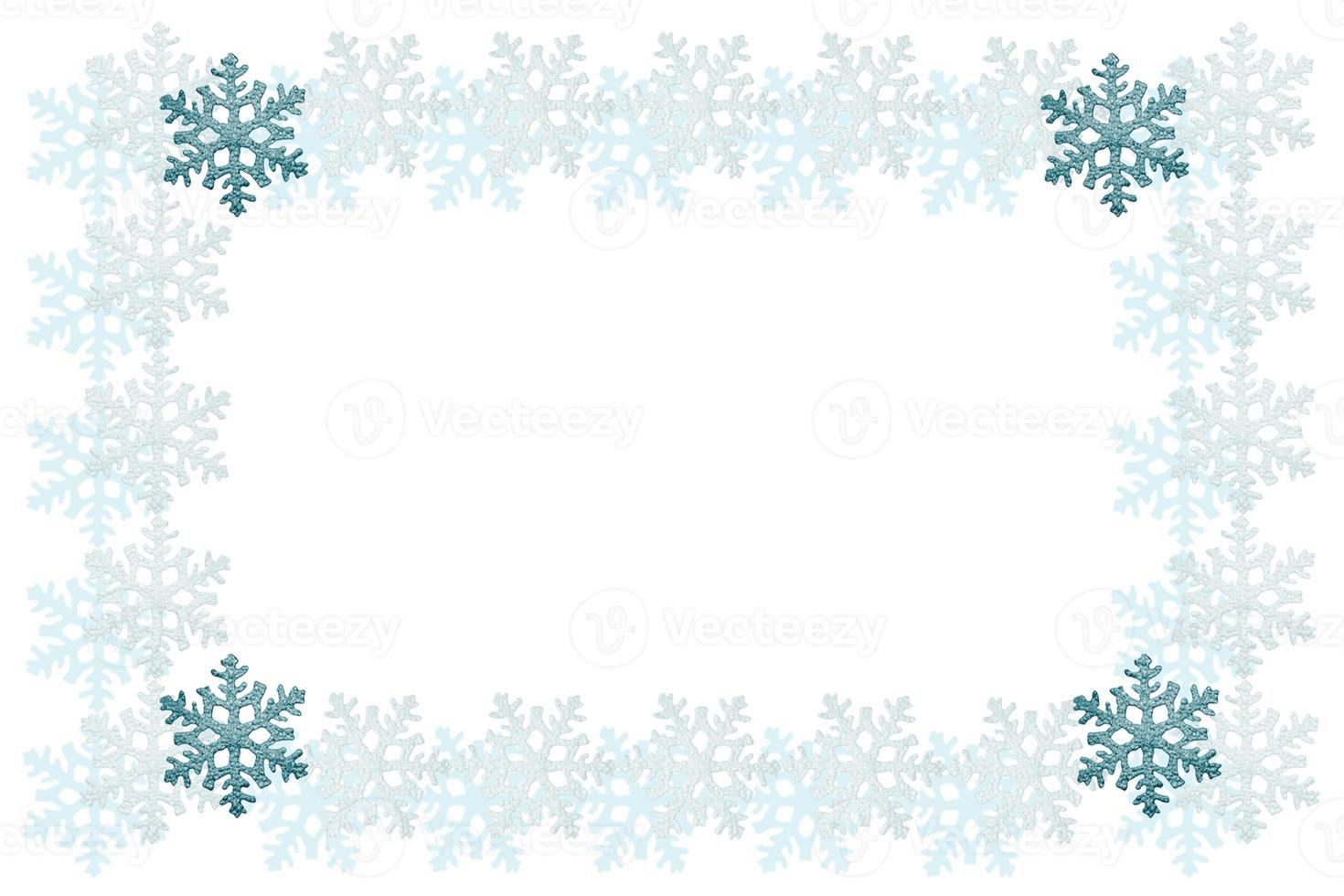 Colorful beautiful snowflakes isolated on white background. Frame. photo