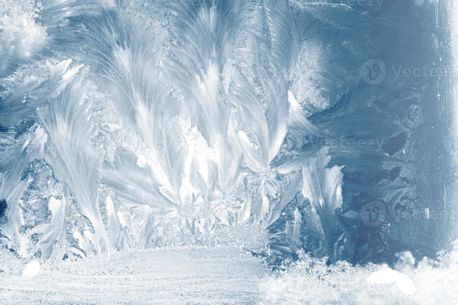 Abstract ice frost natural background with hoarfrost crystals. photo