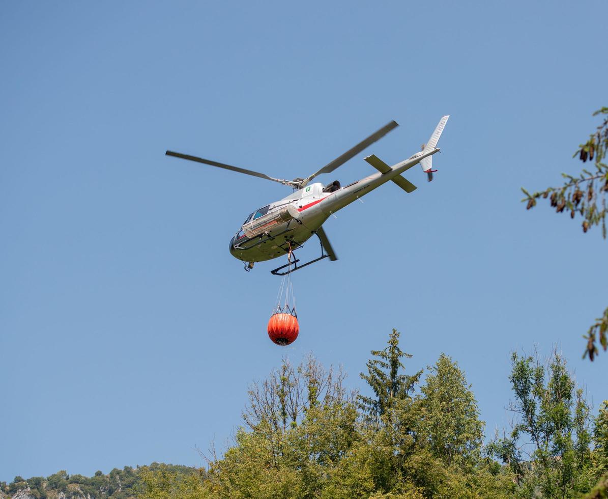 Bergamo Italy July 2022 Helicopter used to transport water to put out fires photo