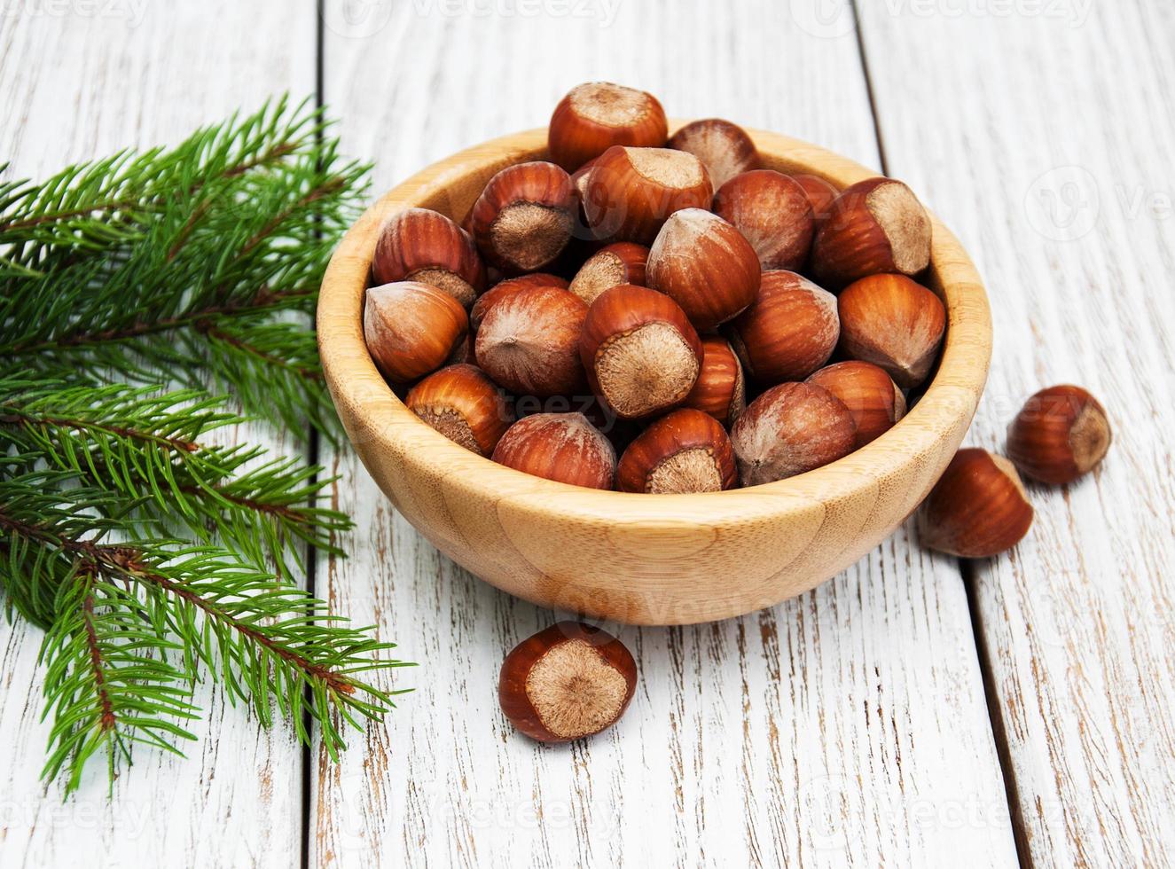 Bowl with hazelnuts photo