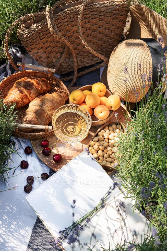 Summer picnic on a lavender field photo