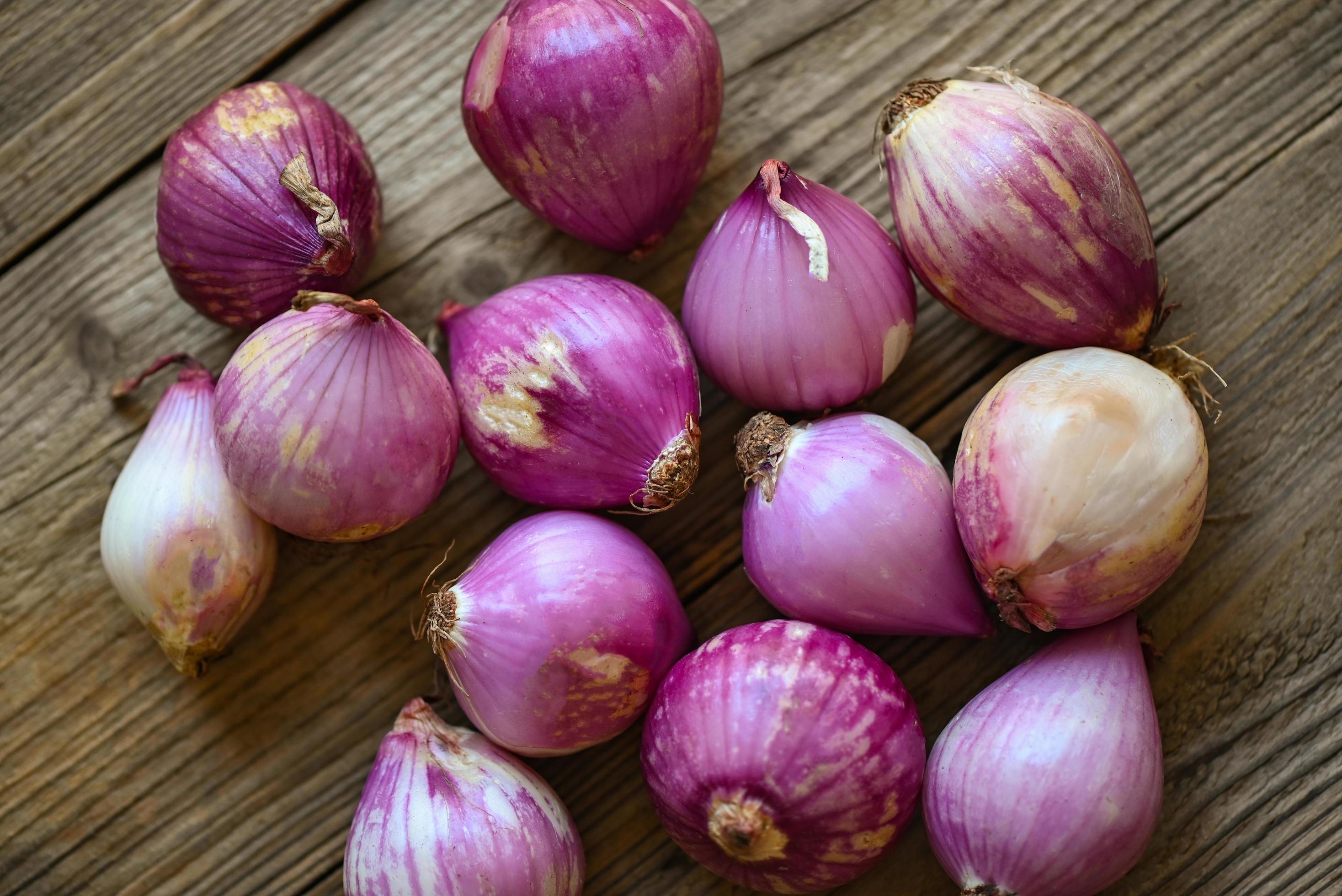 Premium Photo  Shallots or red onion asian herbs and cooking ingredients  on wooden background