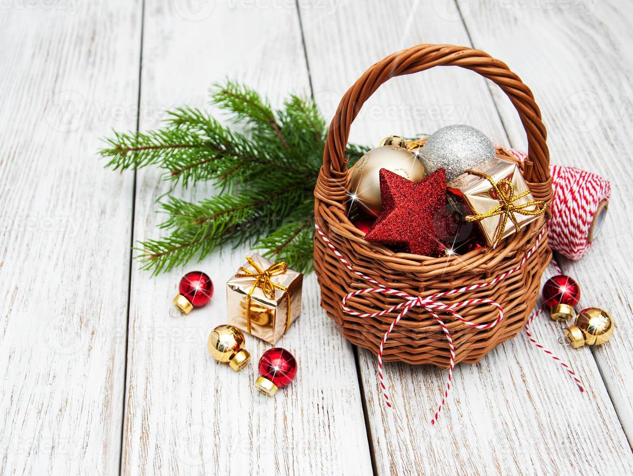 Christmas baubles in basket photo