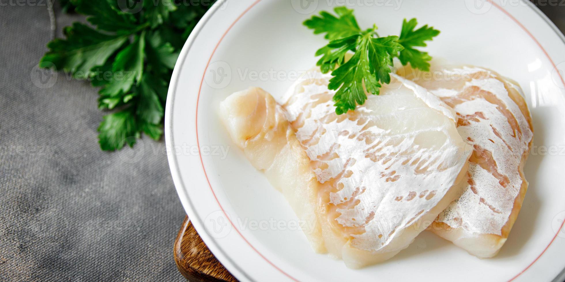 cod fish white skinless fillet fresh meal food snack on the table copy space food background rustic top view photo