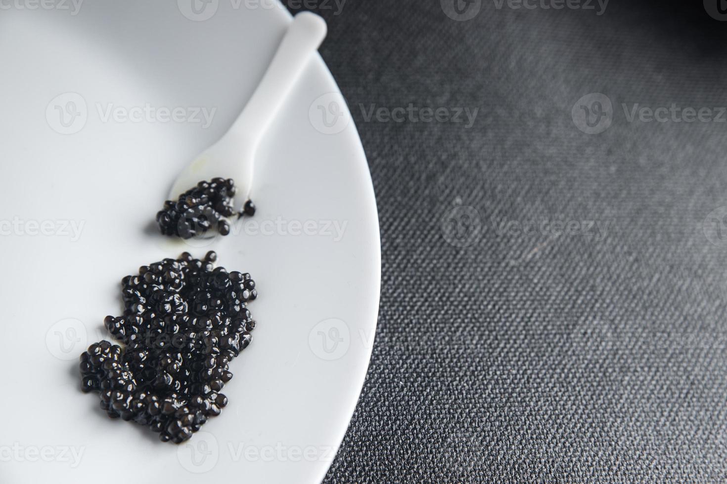 caviar black sturgeon fish beluga, stellate sturgeon fresh healthy meal food snack on the table copy space food background photo