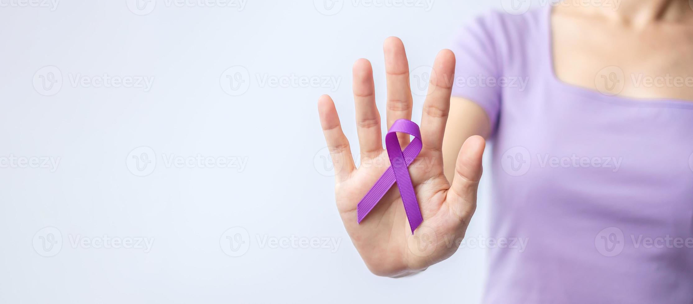 purple Ribbon for Violence, Pancreatic, Esophageal, Testicular cancer, Alzheimer, epilepsy, lupus, Sarcoidosis and Fibromyalgia. Awareness month and World cancer day concept photo