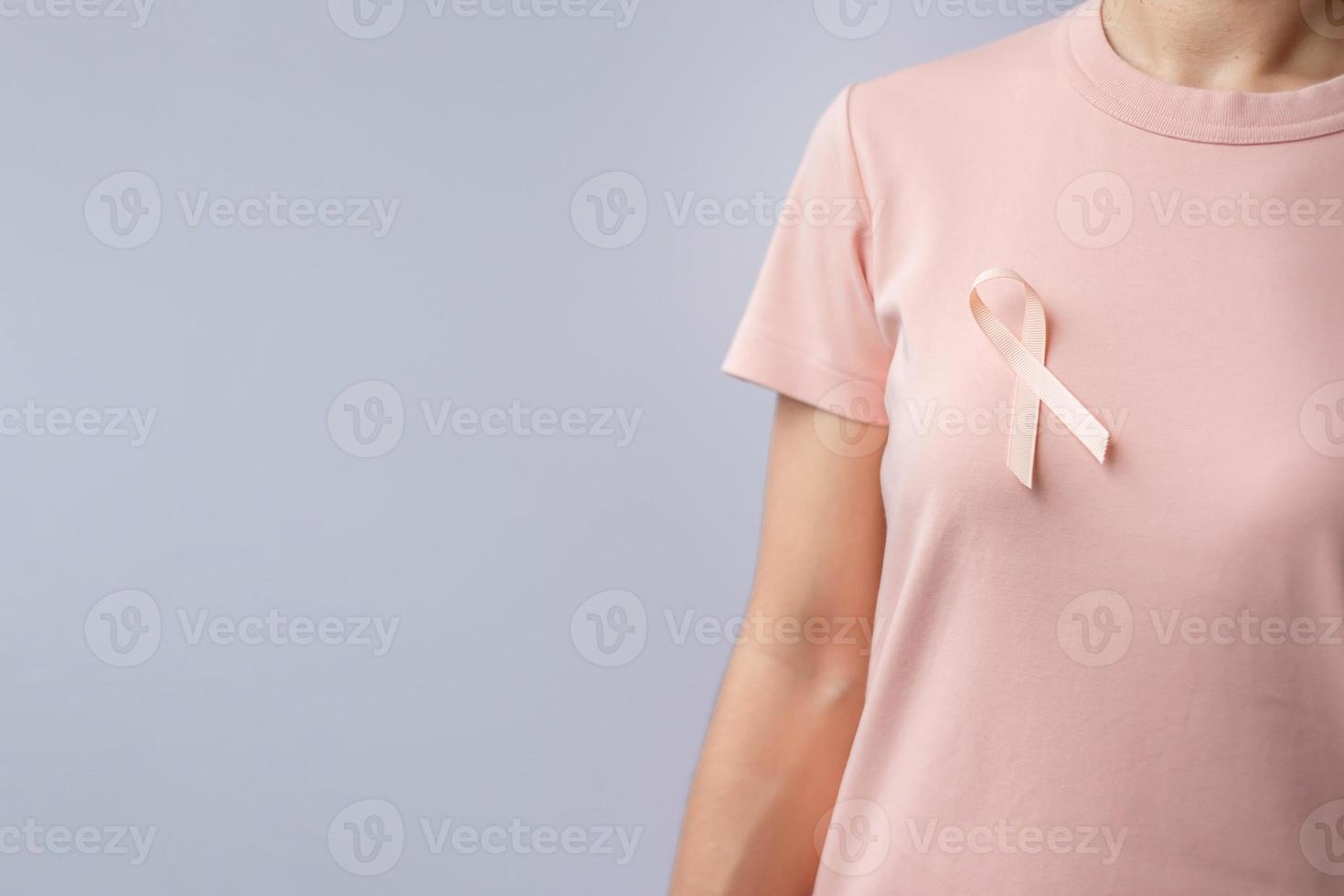 Peach Ribbon for September Uterine Cancer Awareness month. Healthcare and World cancer day concept photo