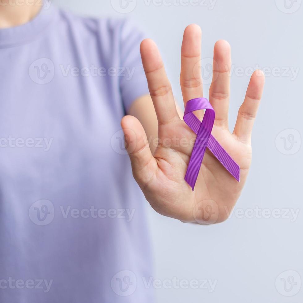 purple Ribbon for Violence, Pancreatic, Esophageal, Testicular cancer, Alzheimer, epilepsy, lupus, Sarcoidosis and Fibromyalgia. Awareness month and World cancer day concept photo