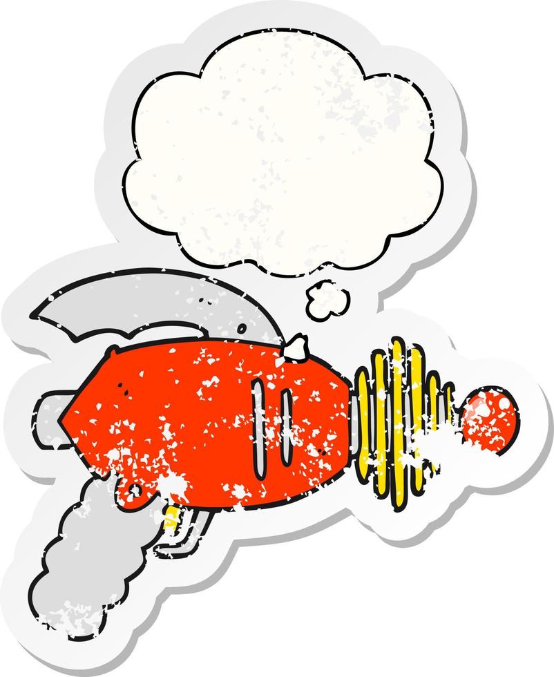 cartoon ray gun and thought bubble as a distressed worn sticker vector