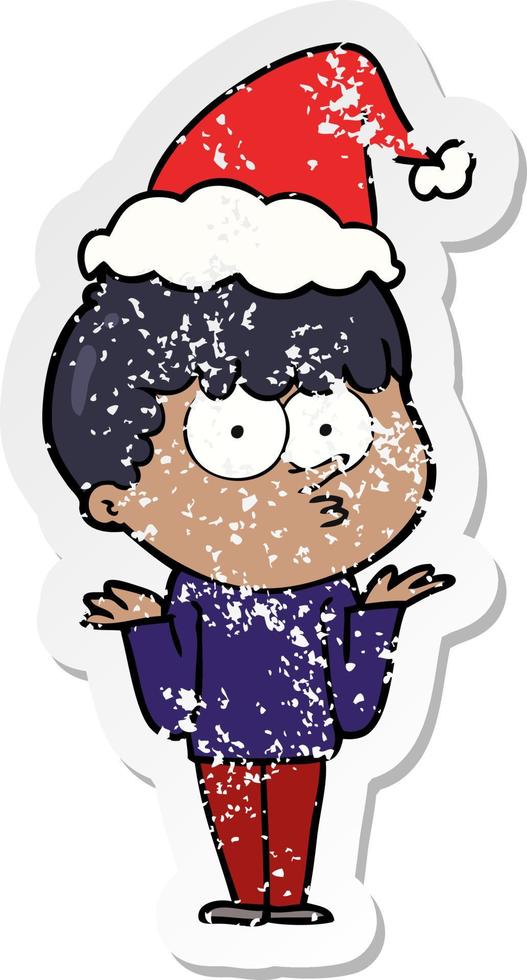 distressed sticker cartoon of a curious boy shrugging shoulders wearing santa hat vector