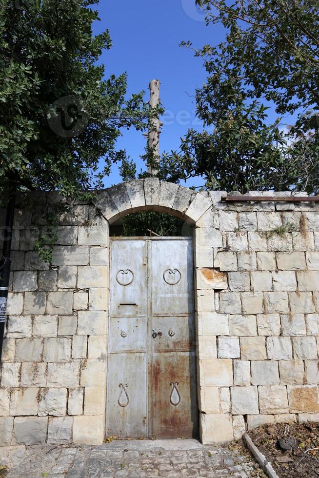 A door is an opening in a wall to enter and exit a building. photo