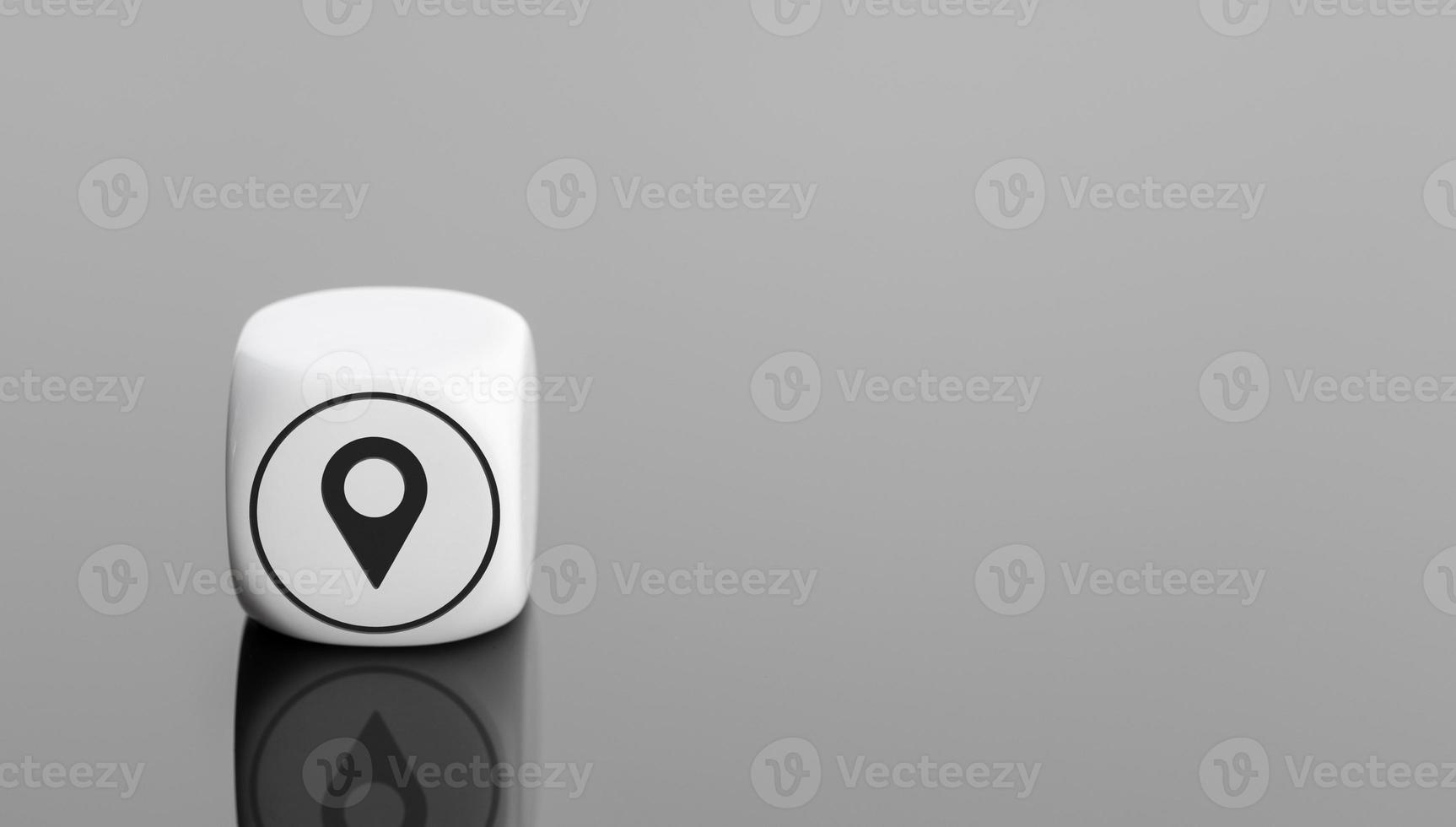 Location concept. Pin of location Icon on white block. Copy space photo