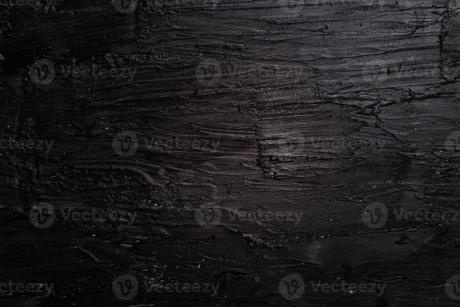 Abstract black texture from acrylic paint photo