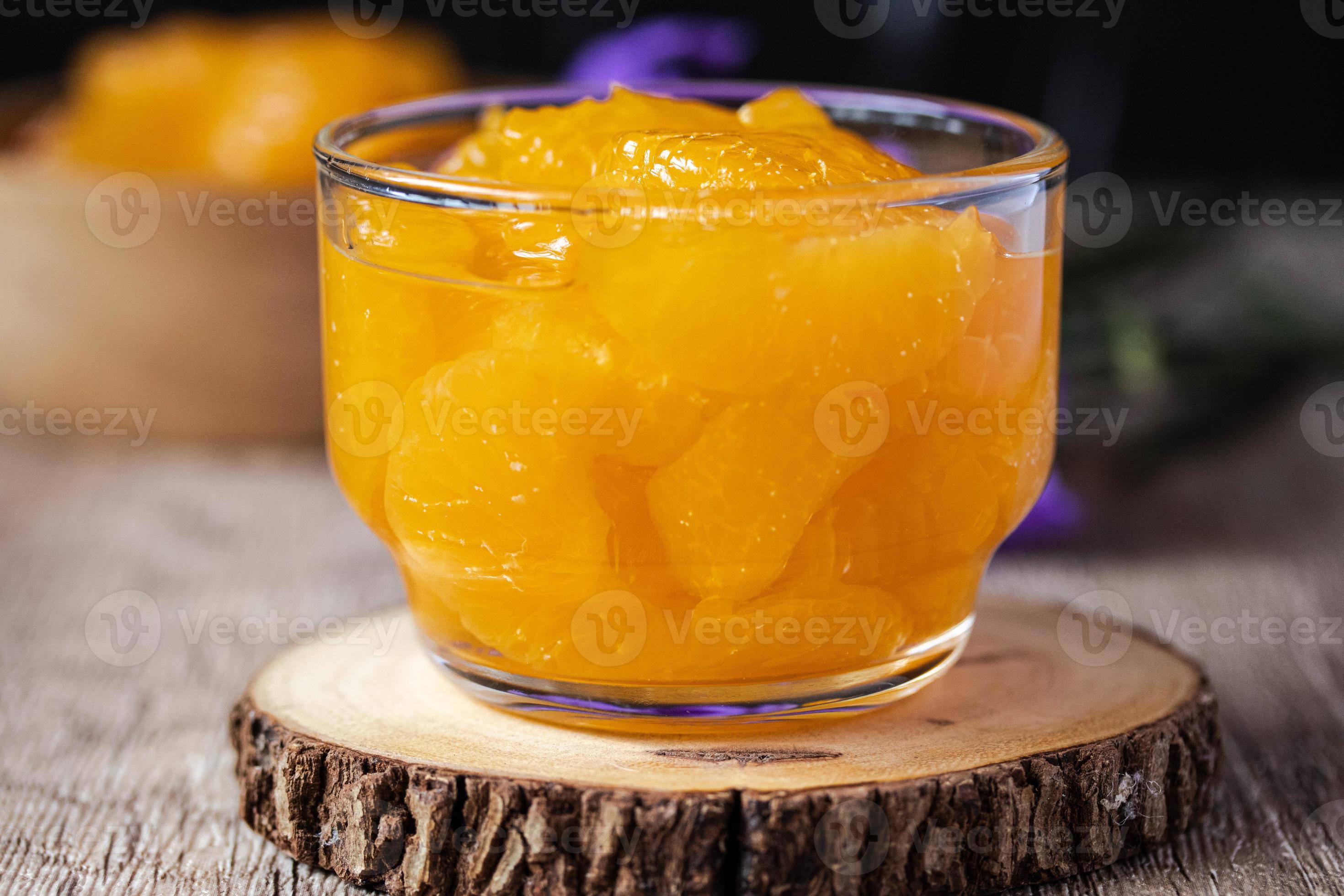 Orange in syrup in clear dessert glass 9880483 Stock Photo at Vecteezy