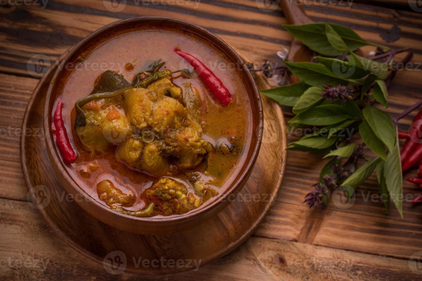 Catfish Curry. Thai food on dark background. Traditional food concept ...