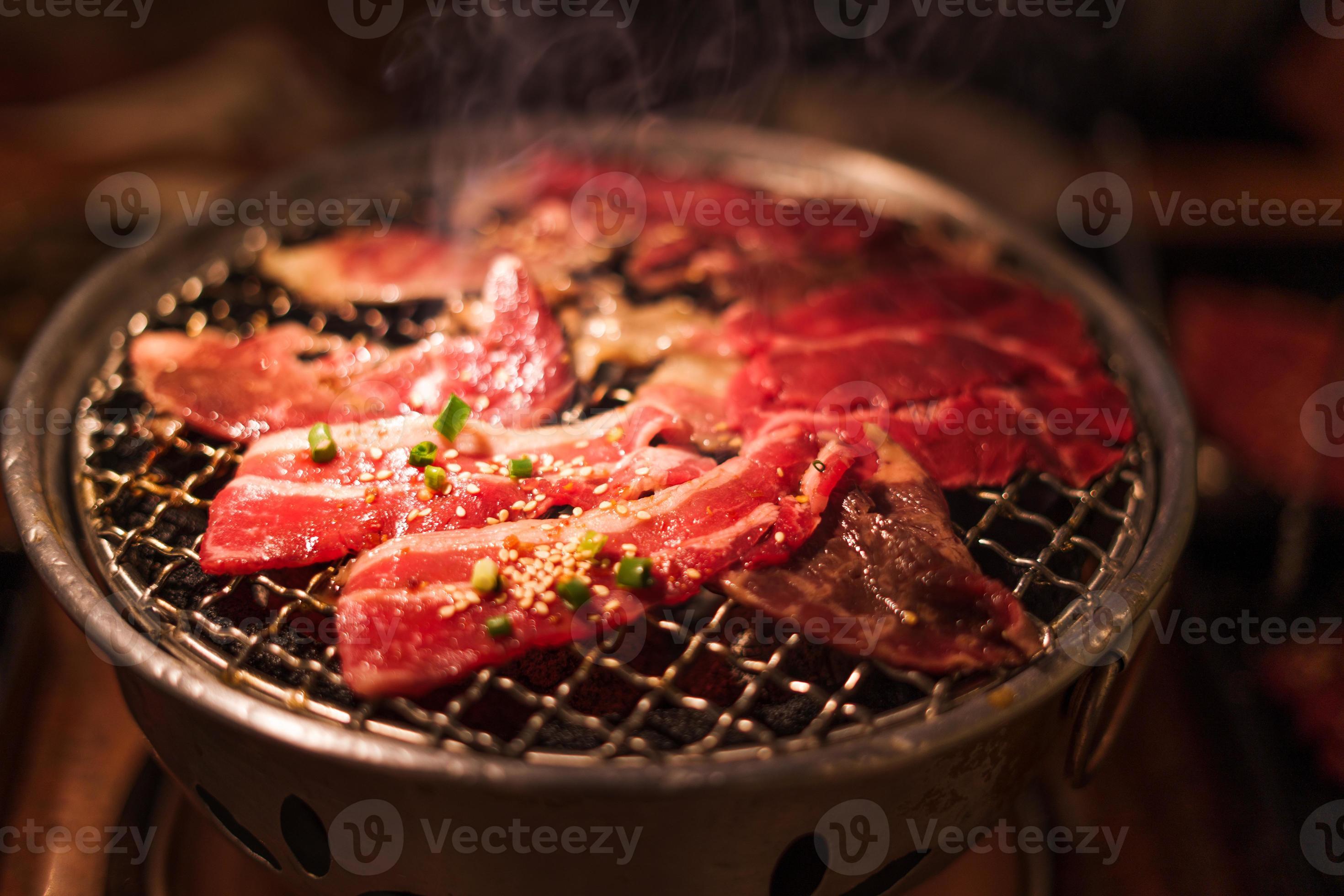 Grilling wagyu beef on charcoal grill 9884717 Stock Photo at Vecteezy