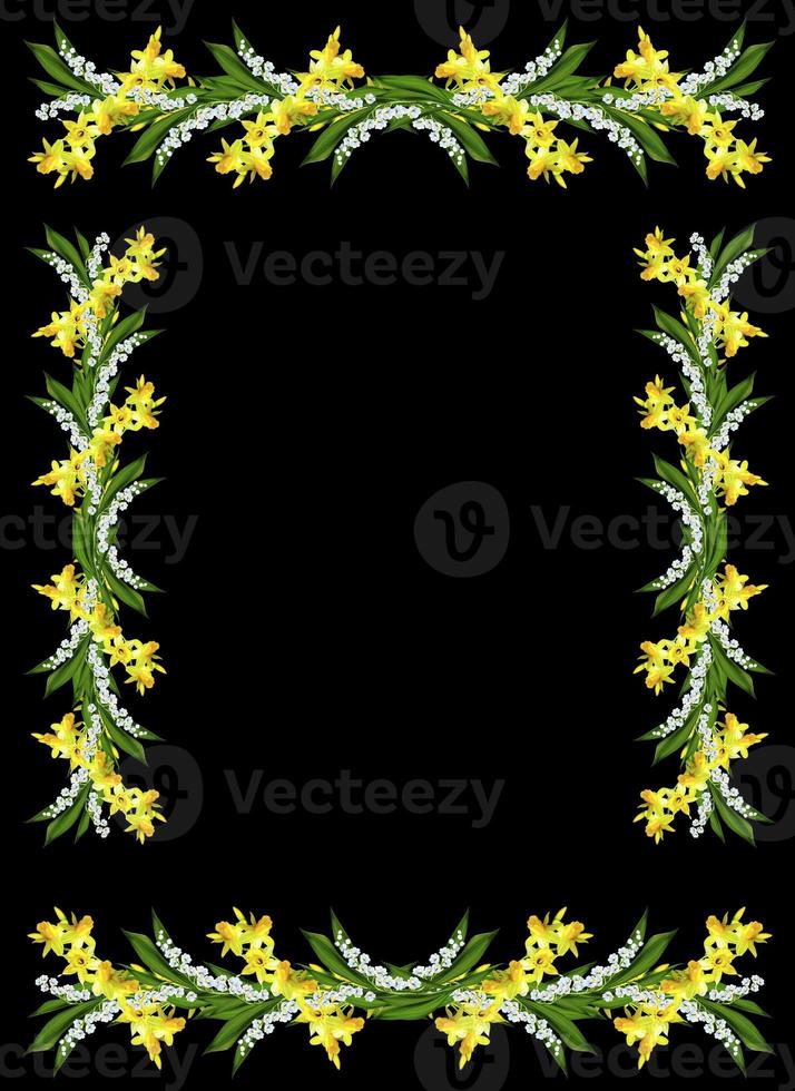 Spring flowers daffodils and lilies of the valley isolated on black background photo