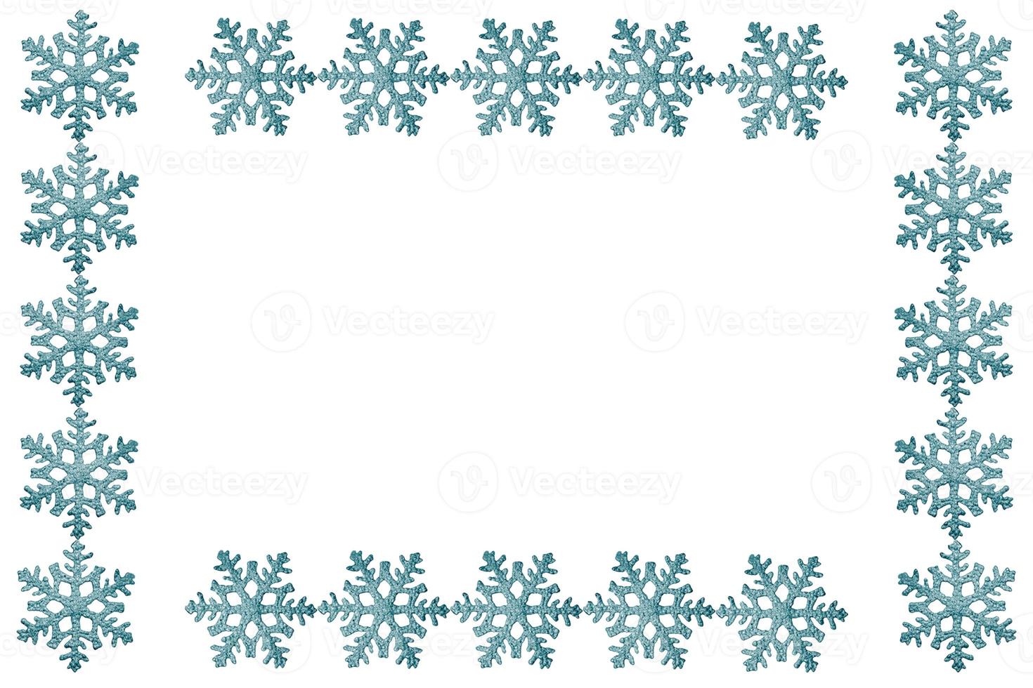 Colorful beautiful snowflakes isolated on white background. Frame. photo