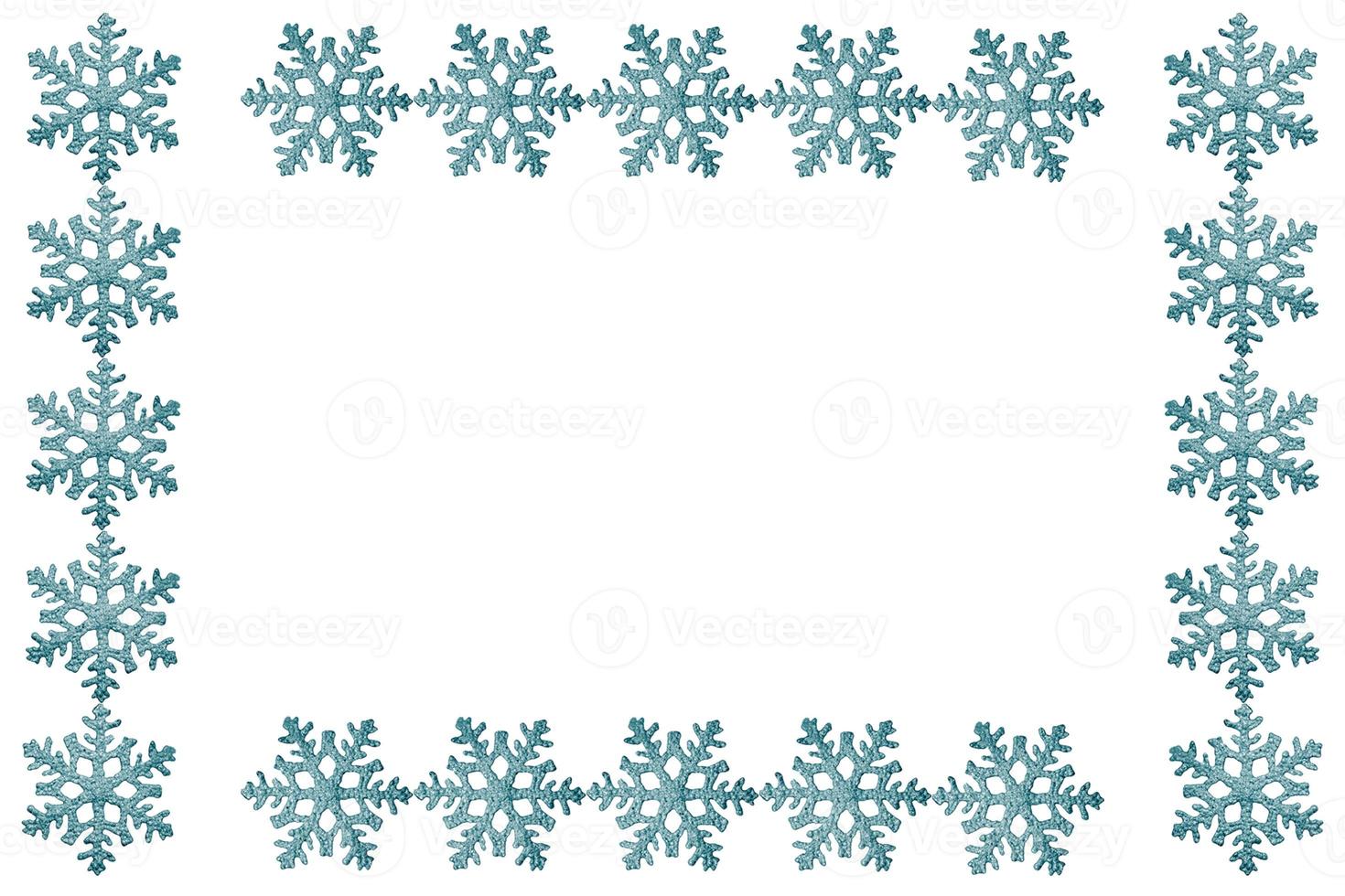 Colorful beautiful snowflakes isolated on white background. Frame. photo