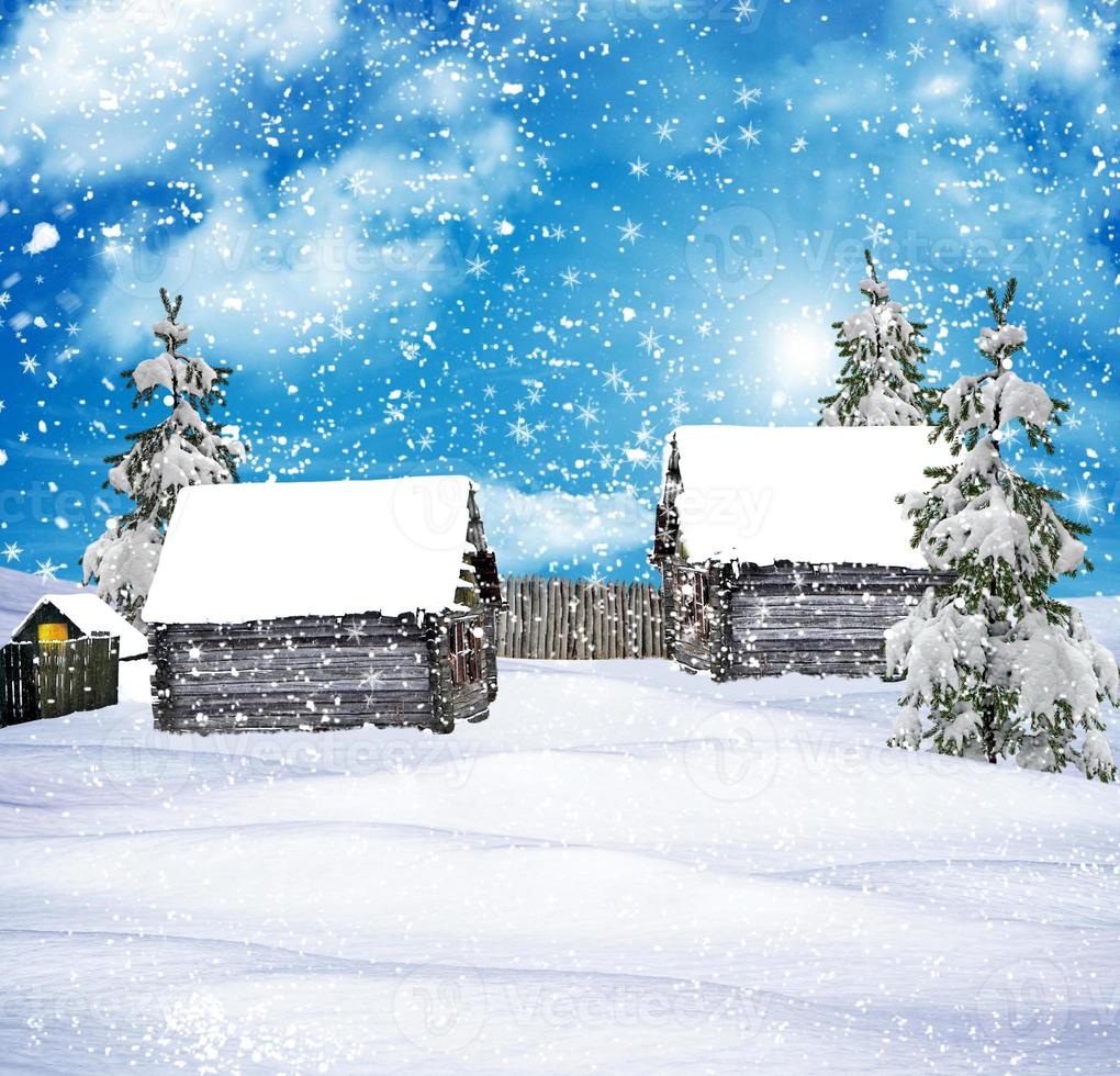 The village in winter forest photo
