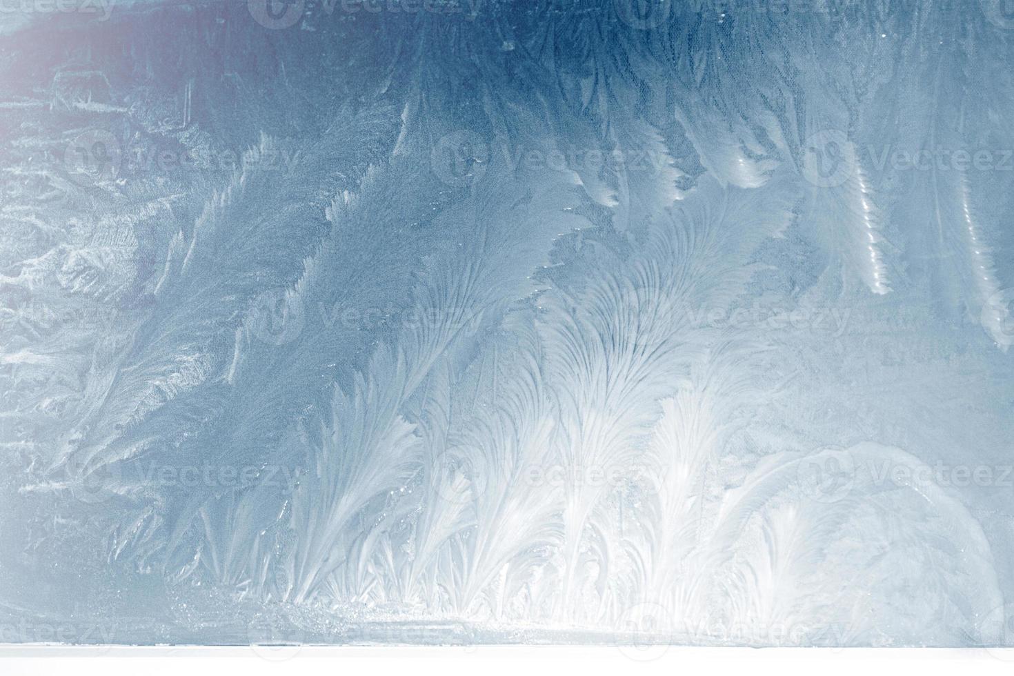 Abstract ice frost natural background with hoarfrost crystals. photo