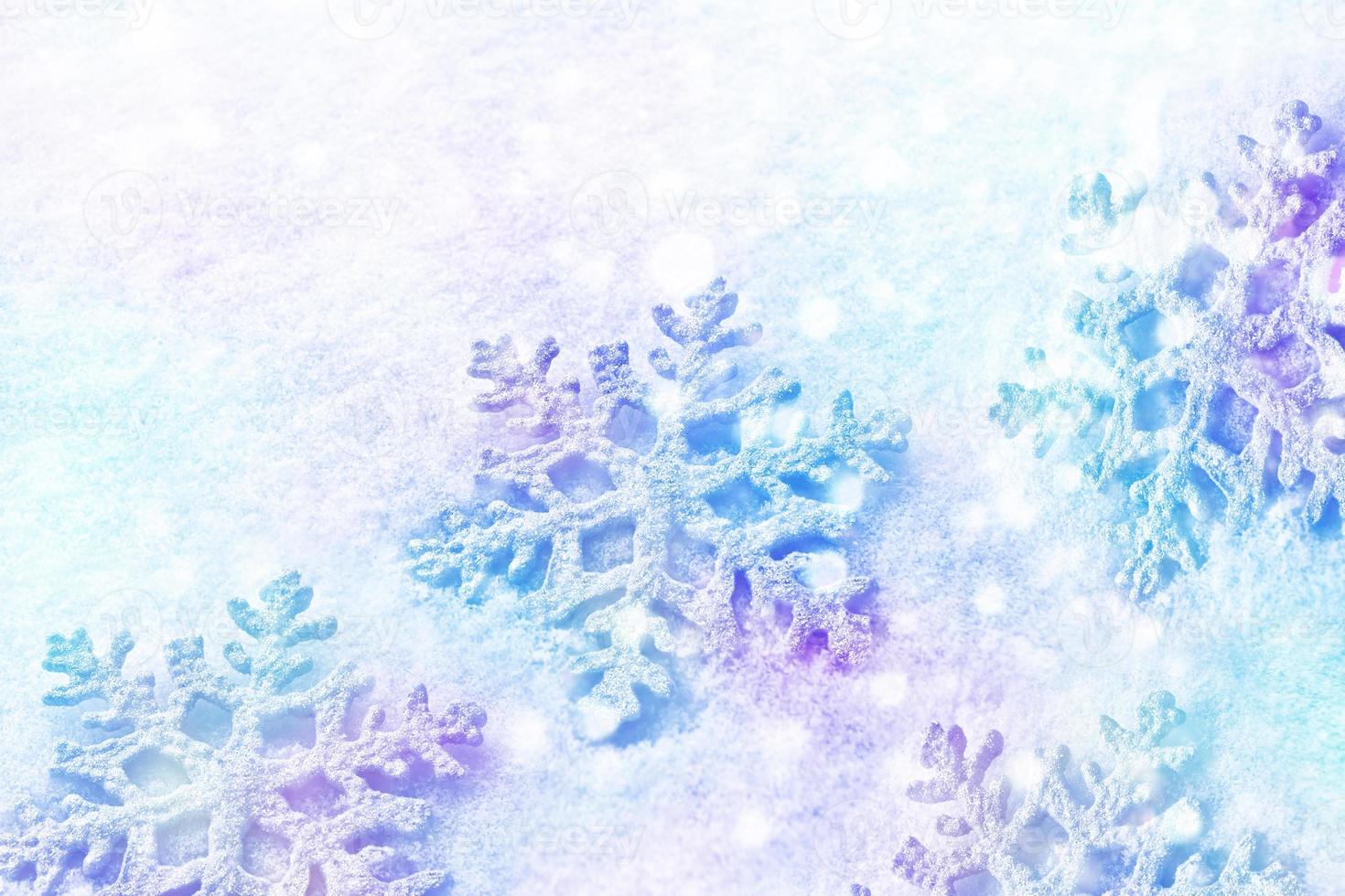 White fluffy snowflakes on snow. Winter christmas background. photo