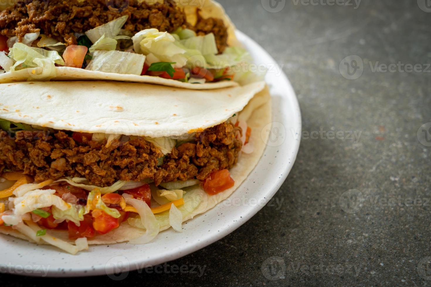 Mexican tacos with minced chicken photo