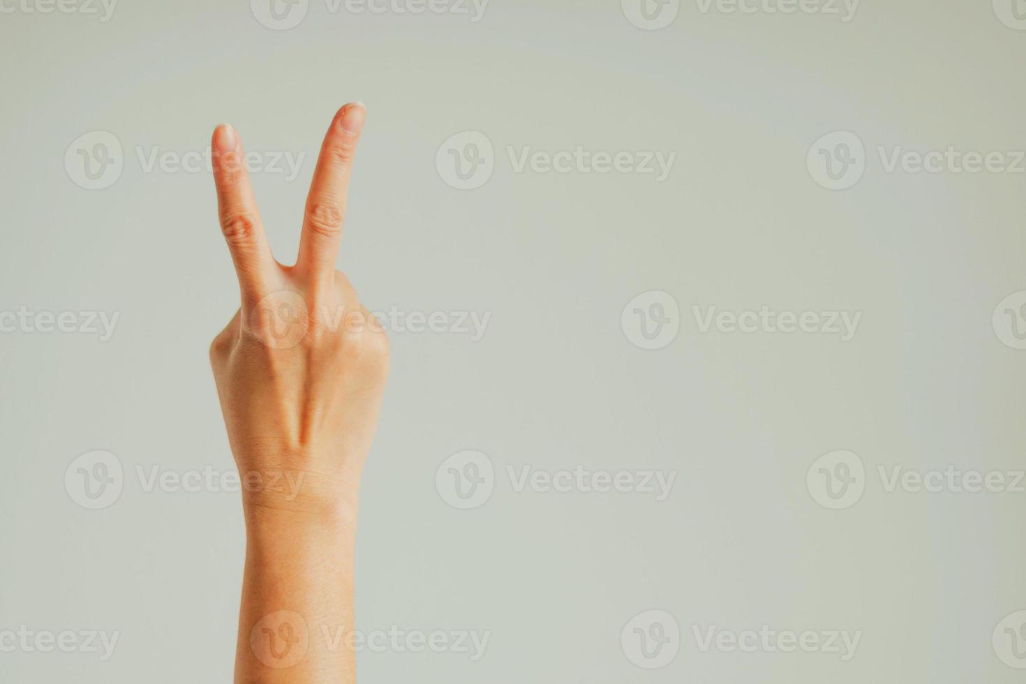 Hand signs meaning that keep fighting. photo