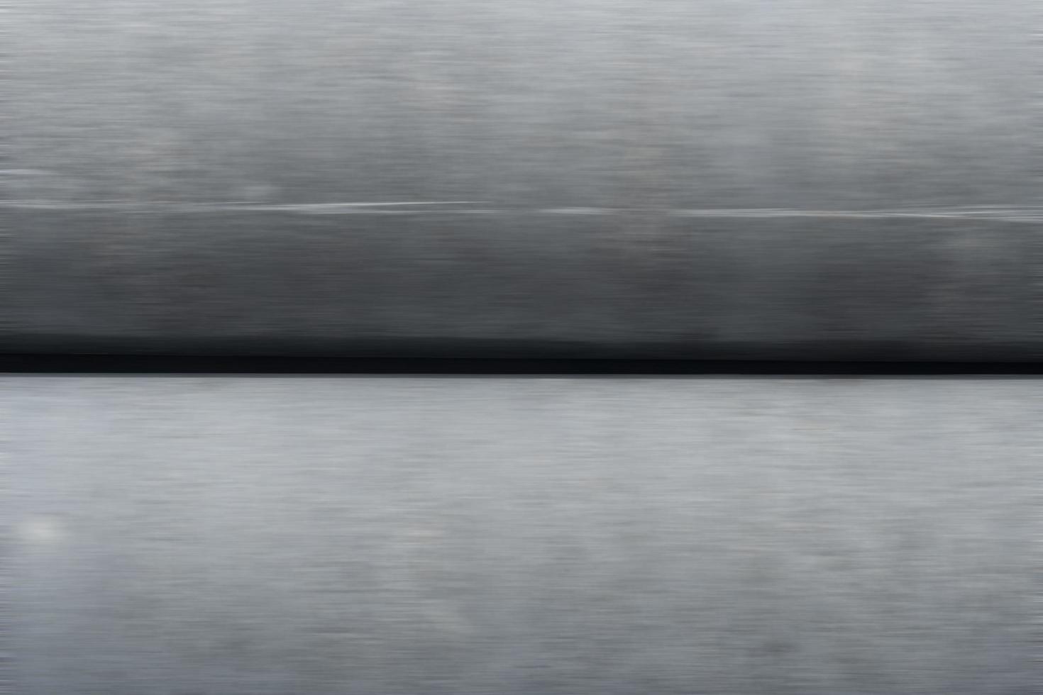 Background and textured of motion speed on the gray material. with background in the center of picture. photo