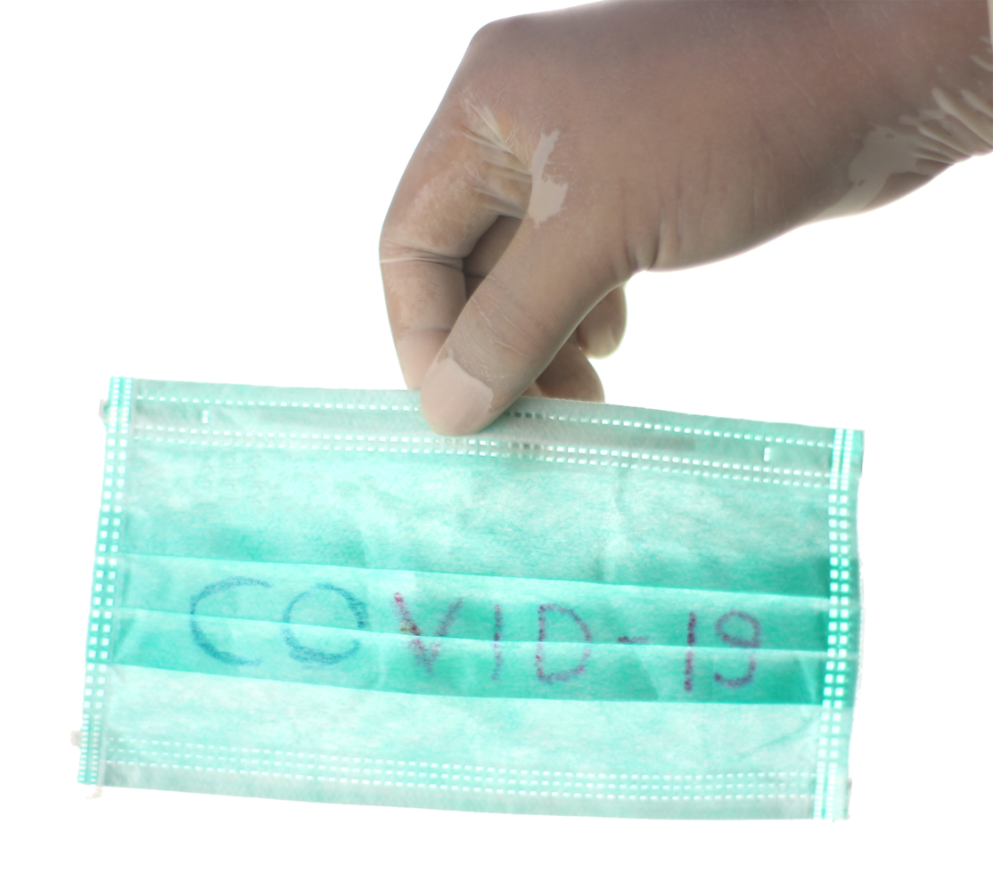 hand is showing medical face masks for covid-19 virus protection on transparent background png file