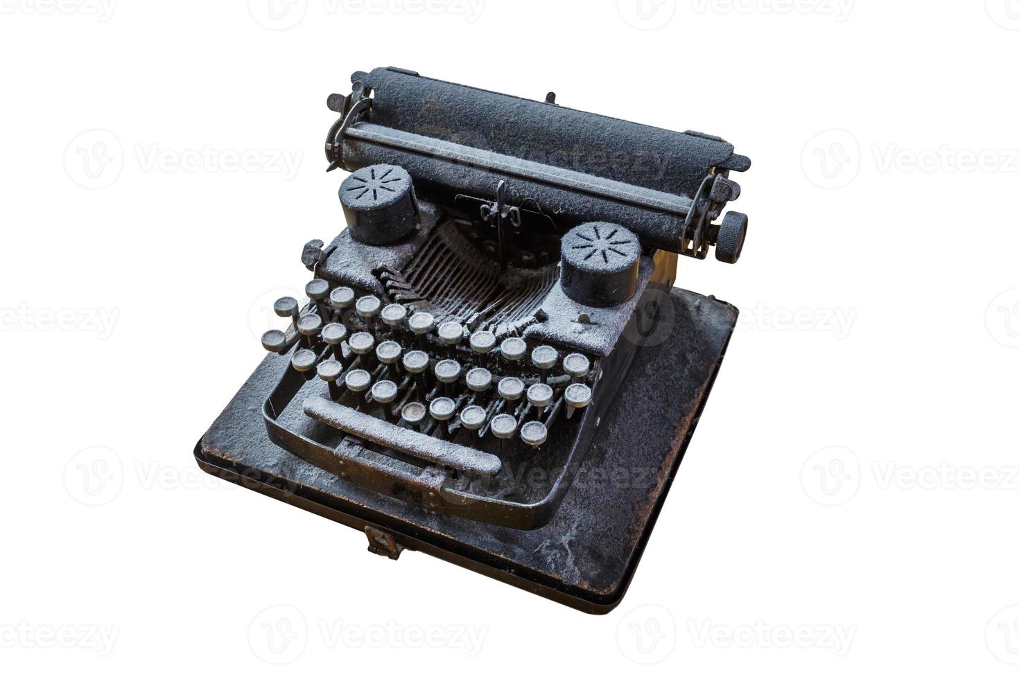 old vintage dust-covered typewriter with sheet of paper isolated on white background photo