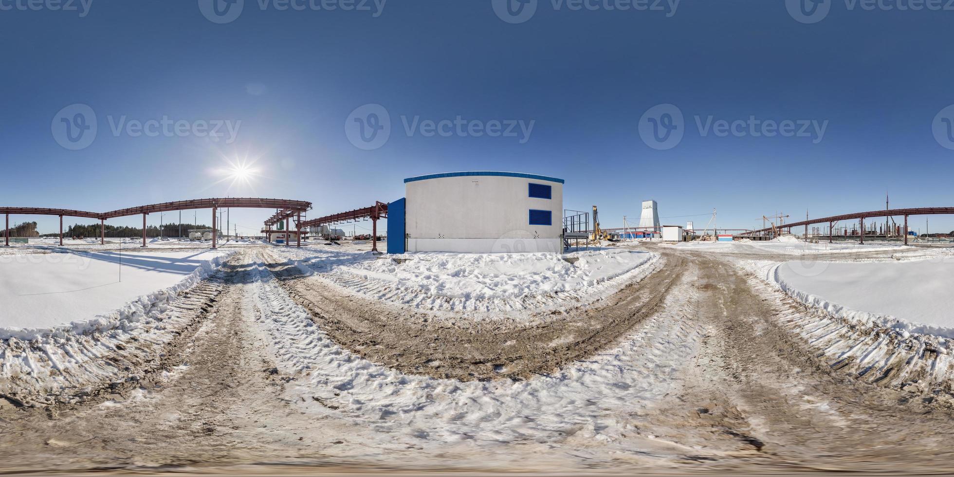 full seamless panorama 360 angle view in winter snow field place site construction of a mining plant in equirectangular equidistant spherical projection, VR content photo