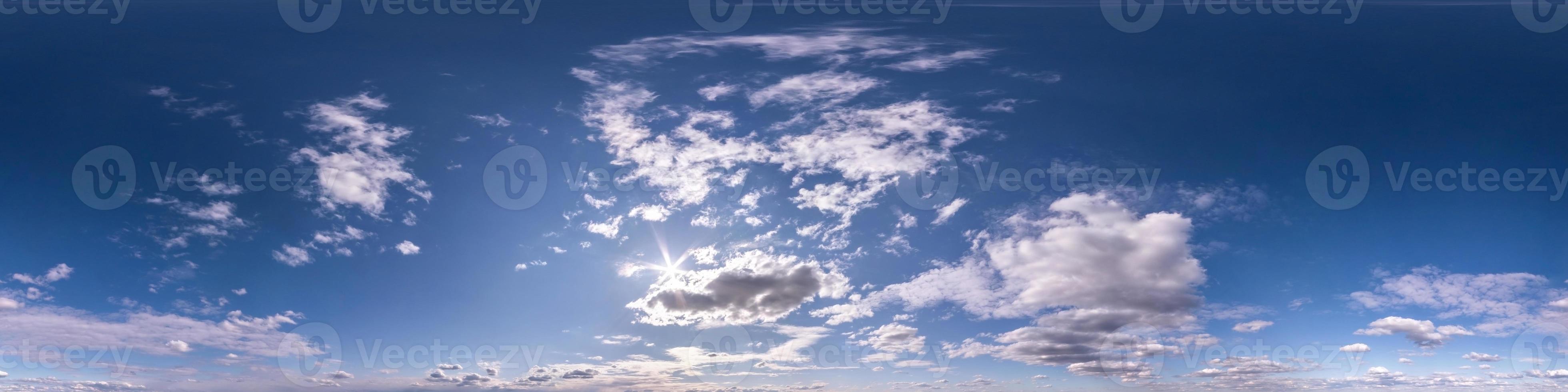 blue sky with beautiful fluffy clouds without ground. Seamless hdri panorama 360 degrees angle view for use in 3d graphics or game development as sky dome or edit drone shot photo