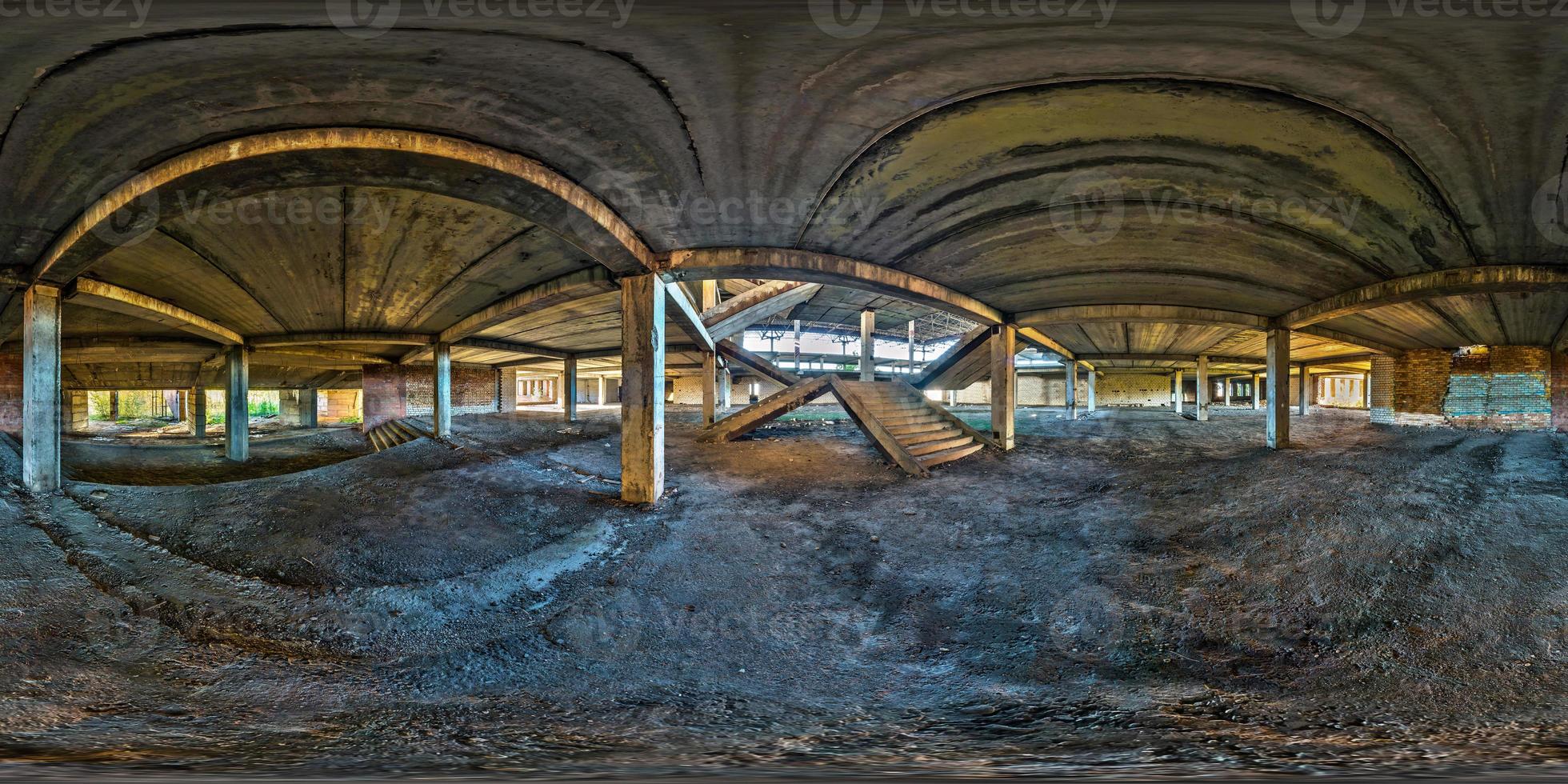 Full spherical seamless hdri panorama 360 degrees angle view concrete structures stairs abandoned unfinished building of airport. 360 panorama in equirectangular equidistant projection, VR AR content photo