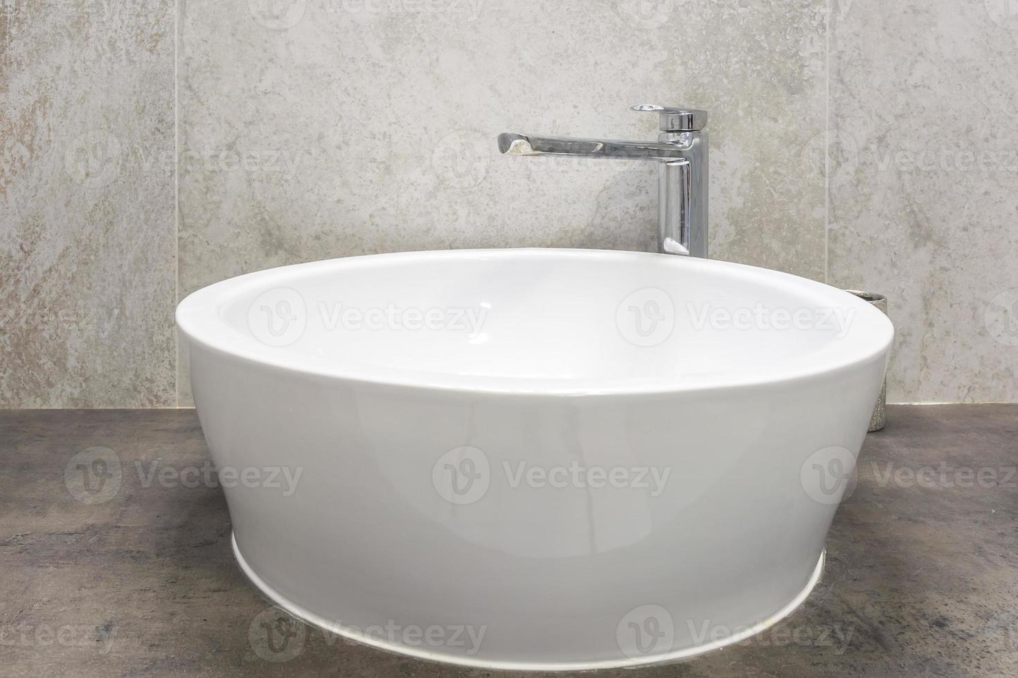 Water tap sink with faucet in expensive loft bathroom photo