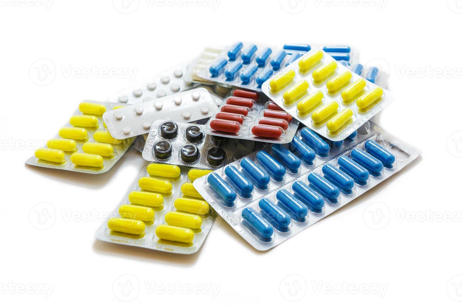 pill packaging and medical supplies on white background photo