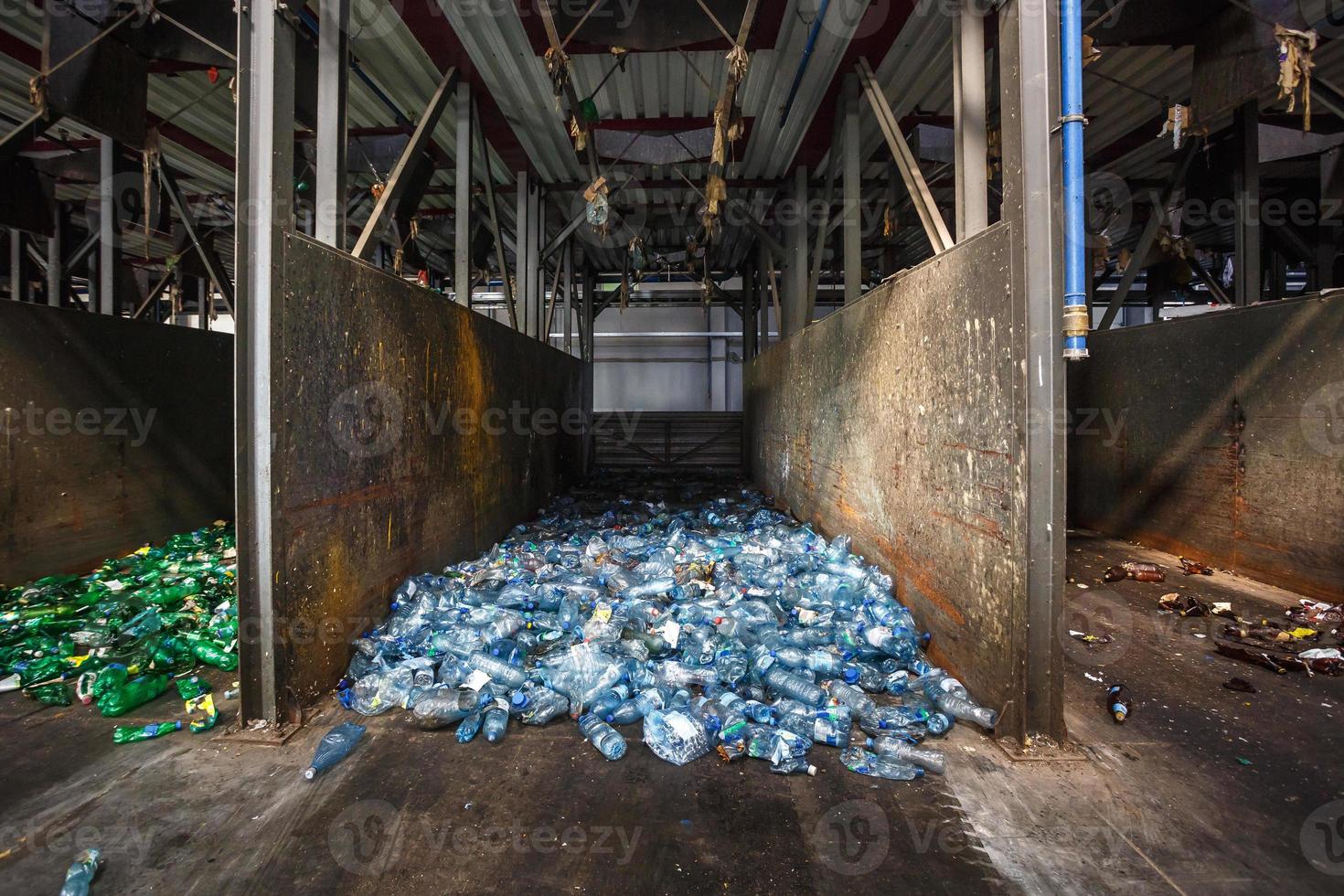 Separate garbage collection and waste sorting at the treatment processing plant. Recycling separate and storage of garbage for further disposal. Business for sorting and processing of trash. photo
