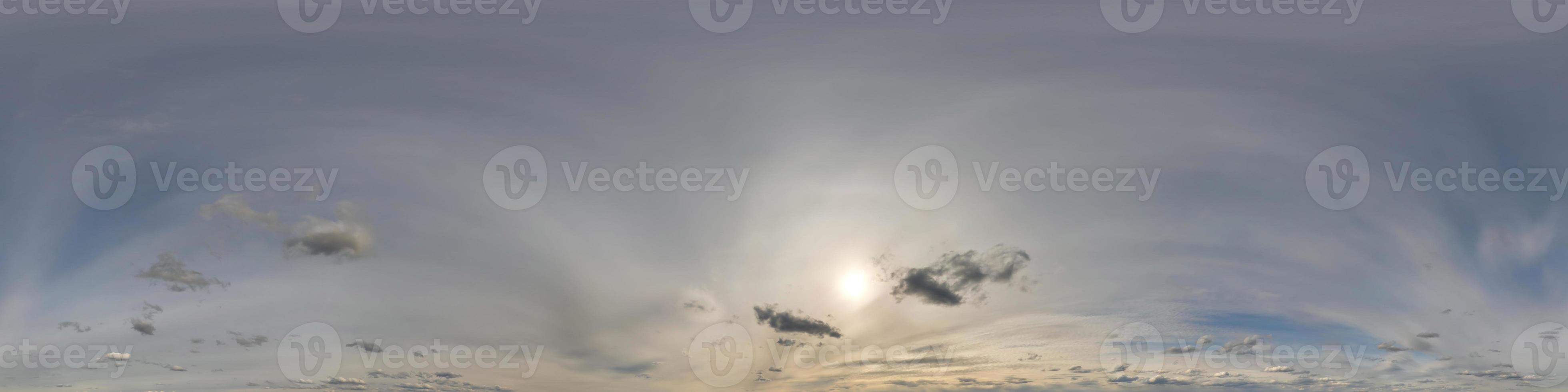 evening dark blue sky hdr 360 panorama with white beautiful clouds in seamless projection with zenith for use in 3d graphics or game development as sky dome or edit drone shot for sky replacement photo