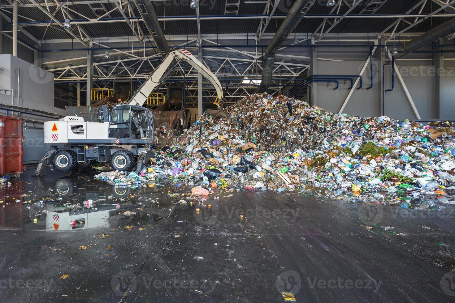 Plastic bales at the waste processing plant. Separate garbage collection. Recycling and storage of waste for further disposal. Business for sorting and processing of waste. photo