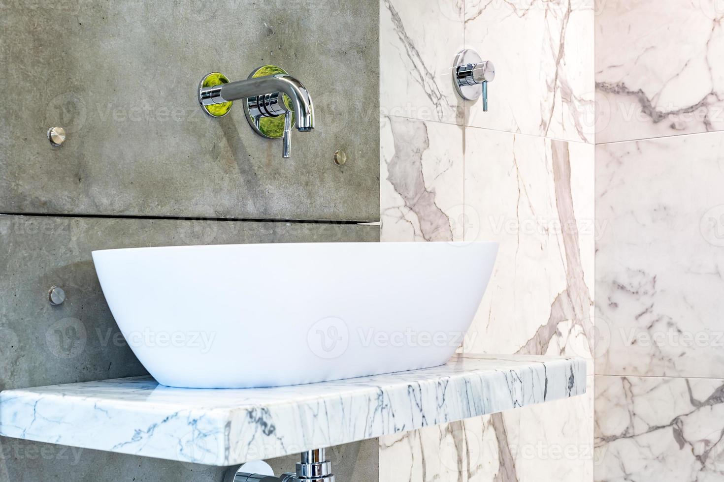 Water tap sink with faucet in expensive loft bathroom photo