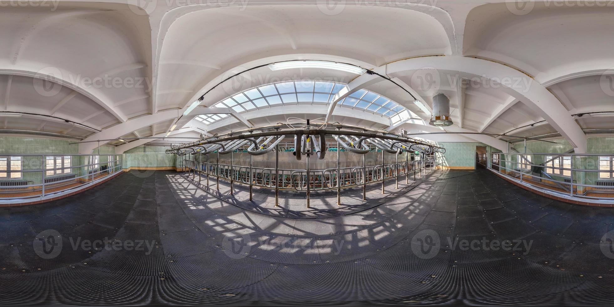 full seamless 360 panorama inside of interior of empty cowshed without cows in equirectangular spherical projection. Breeding cows in free animal husbandry. Livestock cow farm. photo