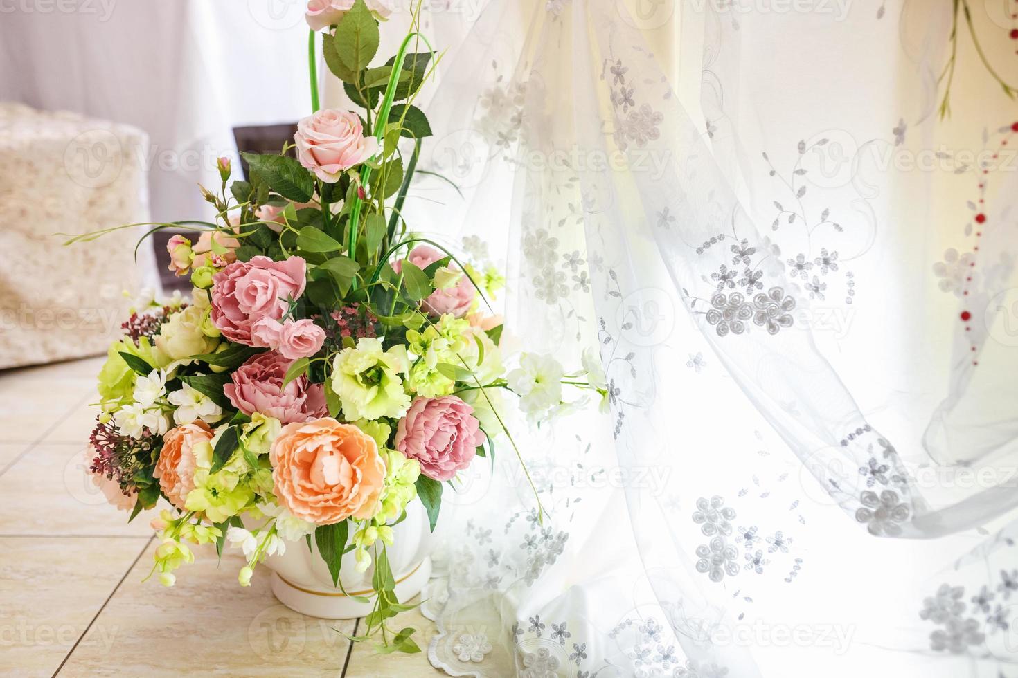 bridal bouquet of white and pink peonies and roses photo